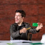 Person applying for a bad credit loan in Canada online with guaranteed approval options and fast funding