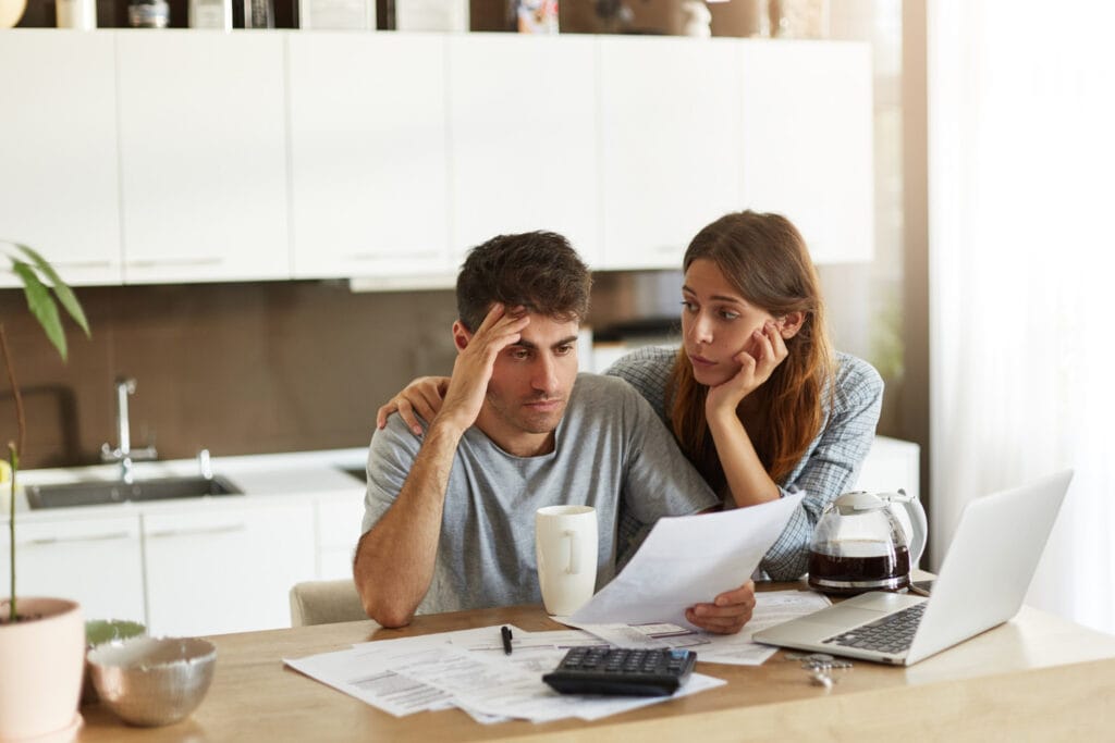 Person needing an emergency loan in Canada applying online for fast cash assistance and quick approval