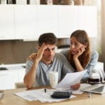 Person needing an emergency loan in Canada applying online for fast cash assistance and quick approval